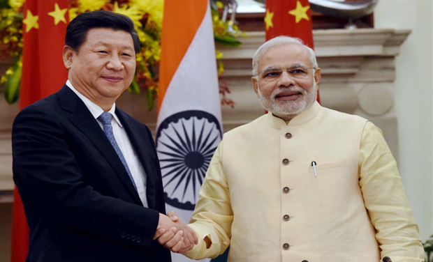 Prime Minister Narendra Modi and Chinese President Xi Jinping shake hands after the joint statement following the agreement signing ceremony at Hyderabad House in New Delhi (Photo: PTI) Prime Minister Narendra Modi and Chinese President Xi Jinping shake hands after the joint statement following the agreement signing ceremony at Hyderabad House in New Delhi (Photo: PTI)